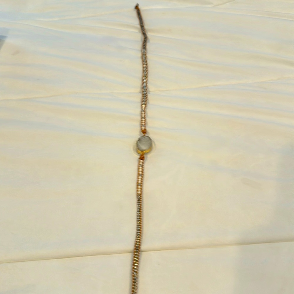 Gorgeous wrap around your wrist bracelet with crystal at center